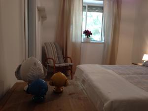 Postel nebo postele na pokoji v ubytování Gelsomoro beach house