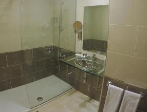 Koupelna v ubytování Hotel Reus Park
