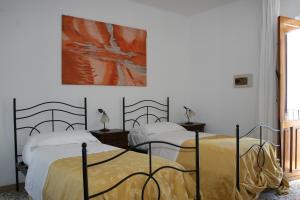 Postel nebo postele na pokoji v ubytování Hotel Tesoriero + 22 fotografií