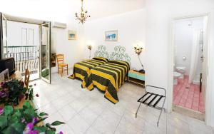 Postel nebo postele na pokoji v ubytování Hotel da Peppe