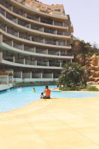 The swimming pool at or close to Gorgeous 2BR Gozo Apt with private balcony & Pool by 360 Estates