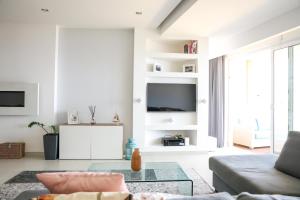 A television and/or entertainment centre at Gorgeous 2BR Gozo Apt with private balcony & Pool by 360 Estates