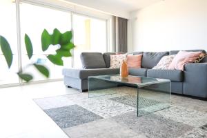 A seating area at Gorgeous 2BR Gozo Apt with private balcony & Pool by 360 Estates