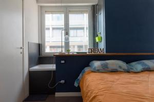 Postelja oz. postelje v sobi nastanitve Centralissimo a due passi dal mare