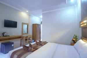Ένα δωμάτιο στο Bakung Sari Resort and Spa
