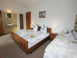 Voodi või voodid majutusasutuse Cozy Apartment in Aschau im Zillertal near Ski Lift toas