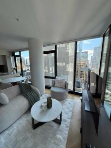 O zonă de relaxare la York St, Sydney Luxurious 2 Bedroom Apartment