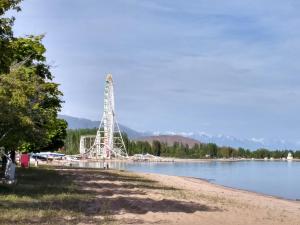 a bridge over a body of water at Parus Hotel in Bosteri +22 photos