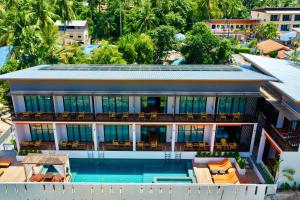 an aerial view of a building with a swimming pool at Mar ozo kohtao in Ko Tao