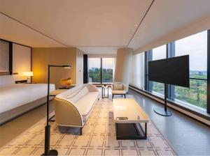 TV a/nebo společenská místnost v ubytování The Ritz-Carlton, Suzhou