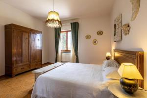 A bed or beds in a room at Villa Raffaella Még 5 kép