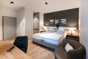 Postel nebo postele na pokoji v ubytování Hotel Friesenhof + 37 fotografií