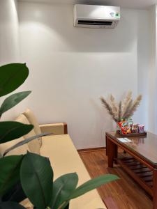 Postel nebo postele na pokoji v ubytování Mer Suites Ha Long + 4 fotografie