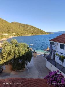 a view of a body of water from a building at Apartmani Bezek in Ston