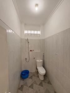 Koupelna v ubytování Dewananda Homestay + 4 fotografie