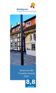 a screenshot of a website with a building at Flair Apartments 'FACHWERK & FLAIR' - Altstadt-Apartment 78 qm für Urlaub oder Geschäftsreise, Innenstadtlage, ruhig, modern, 900 m Bahnhof, 24 Std Check-in, WLAN, Streaming, Küche, Regendusche, 2 x Doppelbett, direkt am neuen Markt in der Altstadt in Herford