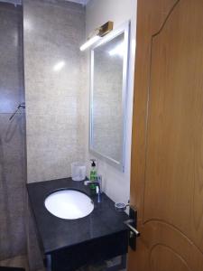 Koupelna v ubytování Grande apartments