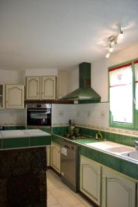 Η κουζίνα ή μικρή κουζίνα στο APPARTEMENT MOUFLONS