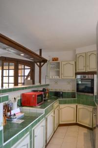 Η κουζίνα ή μικρή κουζίνα στο APPARTEMENT MOUFLONS