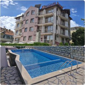 a hotel with a swimming pool in front of a building at Family hotel Favourite in Obzor
