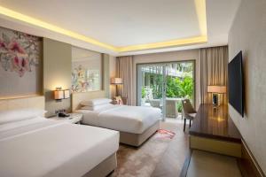 Letto o letti in una camera di Sheraton Bandung Hotel & Towers