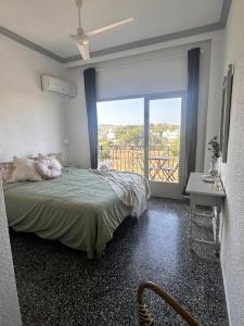 Voodi või voodid majutusasutuse Hostal Flamingo by Nest toas
