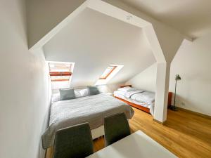 Cama o camas de una habitación en Krakovka Residence