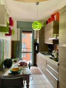 Kuchyň nebo kuchyňský kout v ubytování Bnbook - Ferrarin Apartment