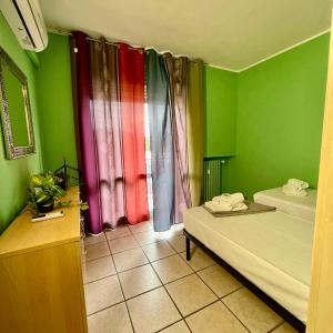 Postel nebo postele na pokoji v ubytování Bnbook - Ferrarin Apartment