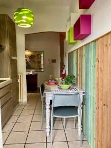 Kuchyň nebo kuchyňský kout v ubytování Bnbook - Ferrarin Apartment