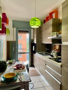 Kuchyň nebo kuchyňský kout v ubytování Bnbook - Ferrarin Apartment