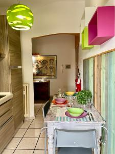 Kuchyň nebo kuchyňský kout v ubytování Bnbook - Ferrarin Apartment