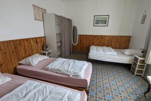 Posteľ alebo postele v izbe v ubytovaní Vacation house between port and beach with garage