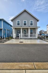 a large house with a driveway in front of it at Back To The Beach in Ocean Shores