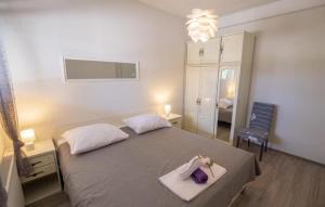 Ένα ή περισσότερα κρεβάτια σε δωμάτιο στο Villa Marijana-Makarska by Villas Guide +34 φωτογραφίες