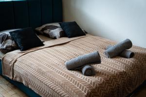 A bed or beds in a room at Royal Aurora Suite