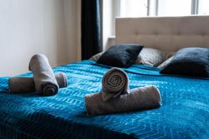 A bed or beds in a room at Royal Aurora Suite