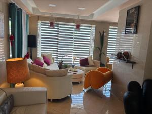 Posezení v ubytování Nikolakakis Rooms Lavrio