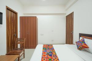 Postel nebo postele na pokoji v ubytování FabHotel Urban Villa