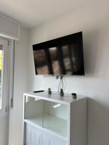 TV a/nebo společenská místnost v ubytování Venice Rooms