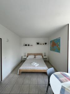 Postel nebo postele na pokoji v ubytování Venice Rooms