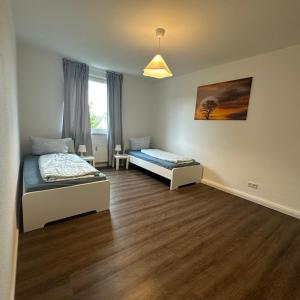 Ένα ή περισσότερα κρεβάτια σε δωμάτιο στο WDI - Workers Apartments 2