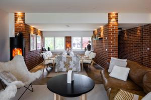 Posezení v ubytování Aino Private Island Hotel