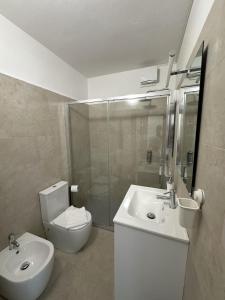 Koupelna v ubytování Venice Rooms