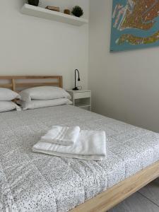 Postel nebo postele na pokoji v ubytování Venice Rooms