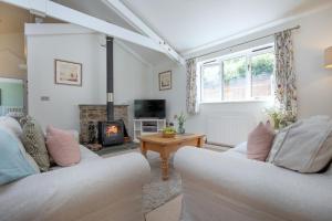 Ruang duduk di Finest Retreats- Little Dunley - Oaktree Cottage