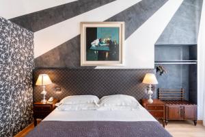 Ένα ή περισσότερα κρεβάτια σε δωμάτιο στο Boutique Hotel Scalzi - Adults Only