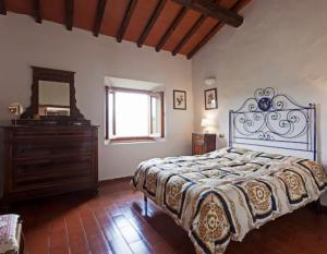Giường trong phòng chung tại La Favilletta Casa Vacanze +51 ảnh