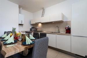 A kitchen or kitchenette at Royal Aurora Suite