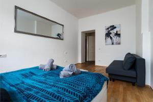 A bed or beds in a room at Royal Aurora Suite